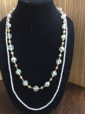 Lot of two necklaces. One facets crystal beads and other glass beads. Beautiful